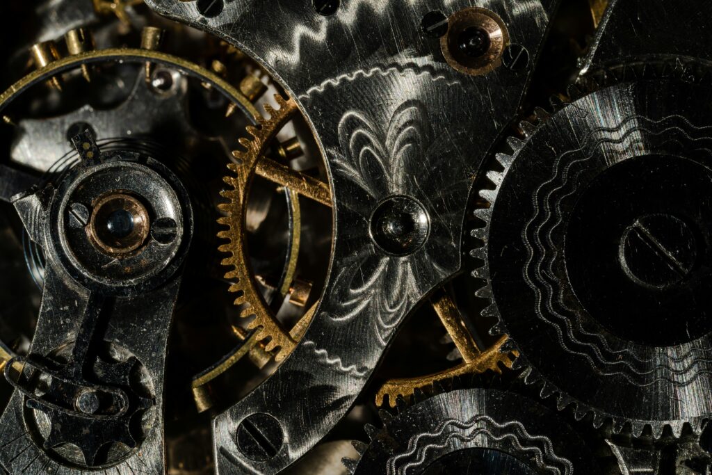 inside gears of a pocket watch